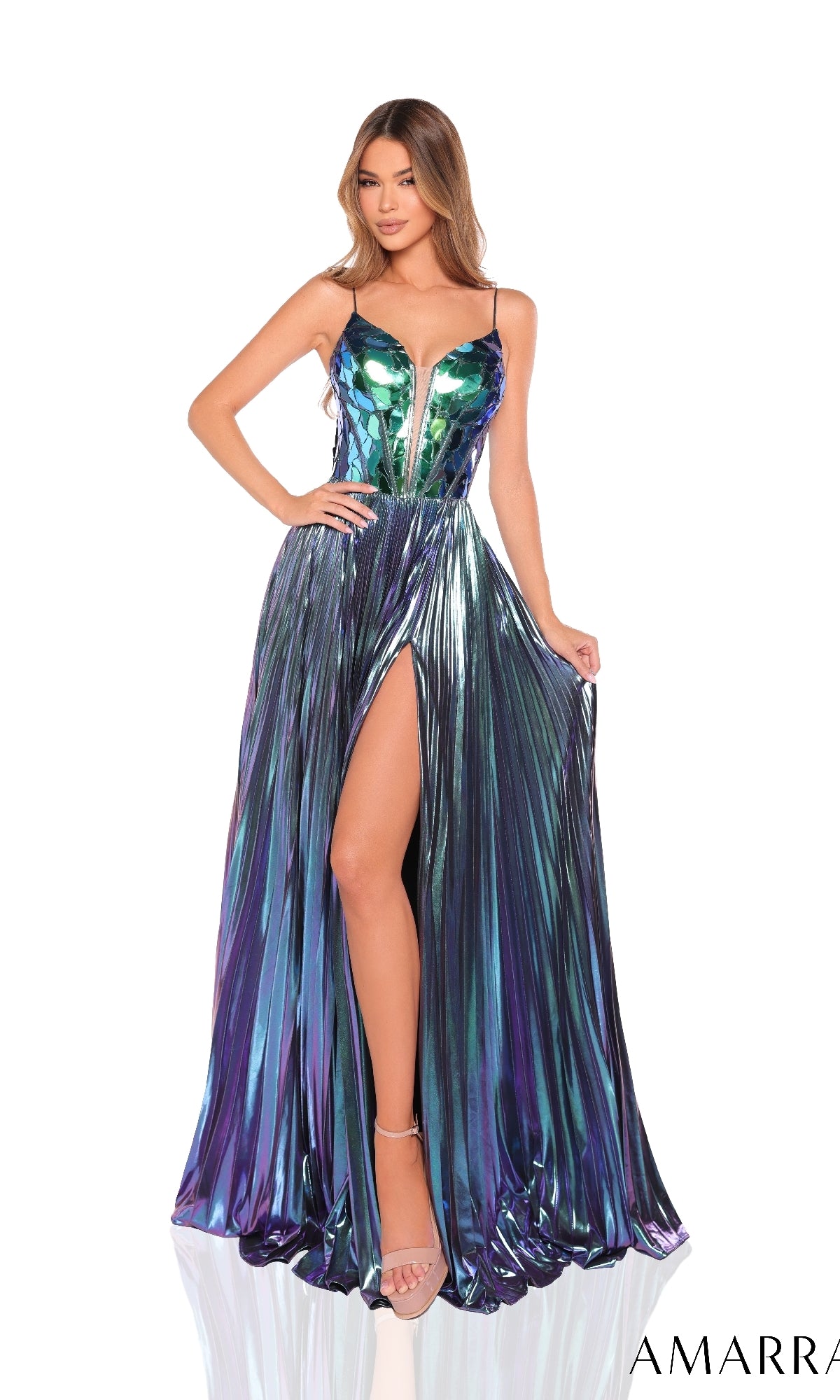 A woman models the Amarra 88267 long prom dress?metallic, iridescent finish, fitted bodice, spaghetti straps, and thigh-high slit?against a white background. Subtle glass-mirror embellishments reflect the light strikingly.